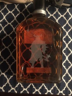 Custom engraved whiskey bottles.