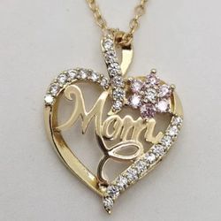 Sparkling heart-shaped necklace and earrings set.