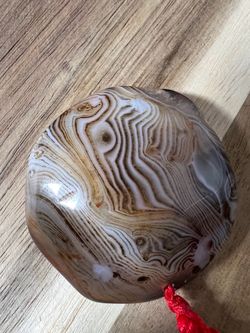 Top-quality polished banded agate crystal: 55g healing agate stone.