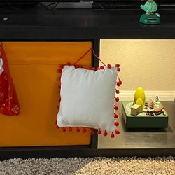 TV Shelf along with colored boxes