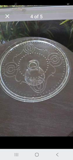 clear glass cake stand on a pedestal base.