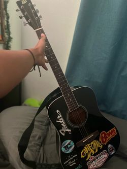 Fender 6 string acoustic guitar.