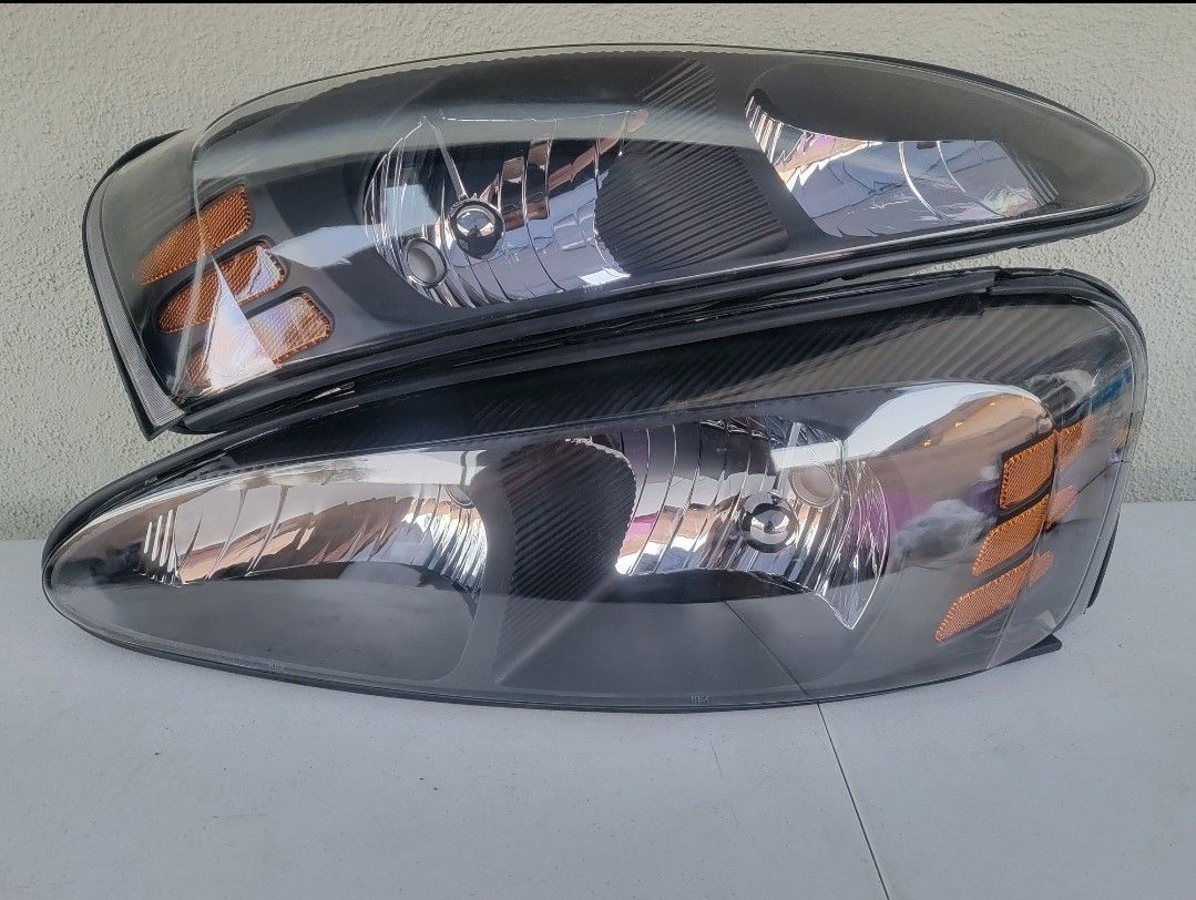 04-08 Pontiac Grand Prix Headlights Luces Micas Calaveras Faros Faroles Focos
