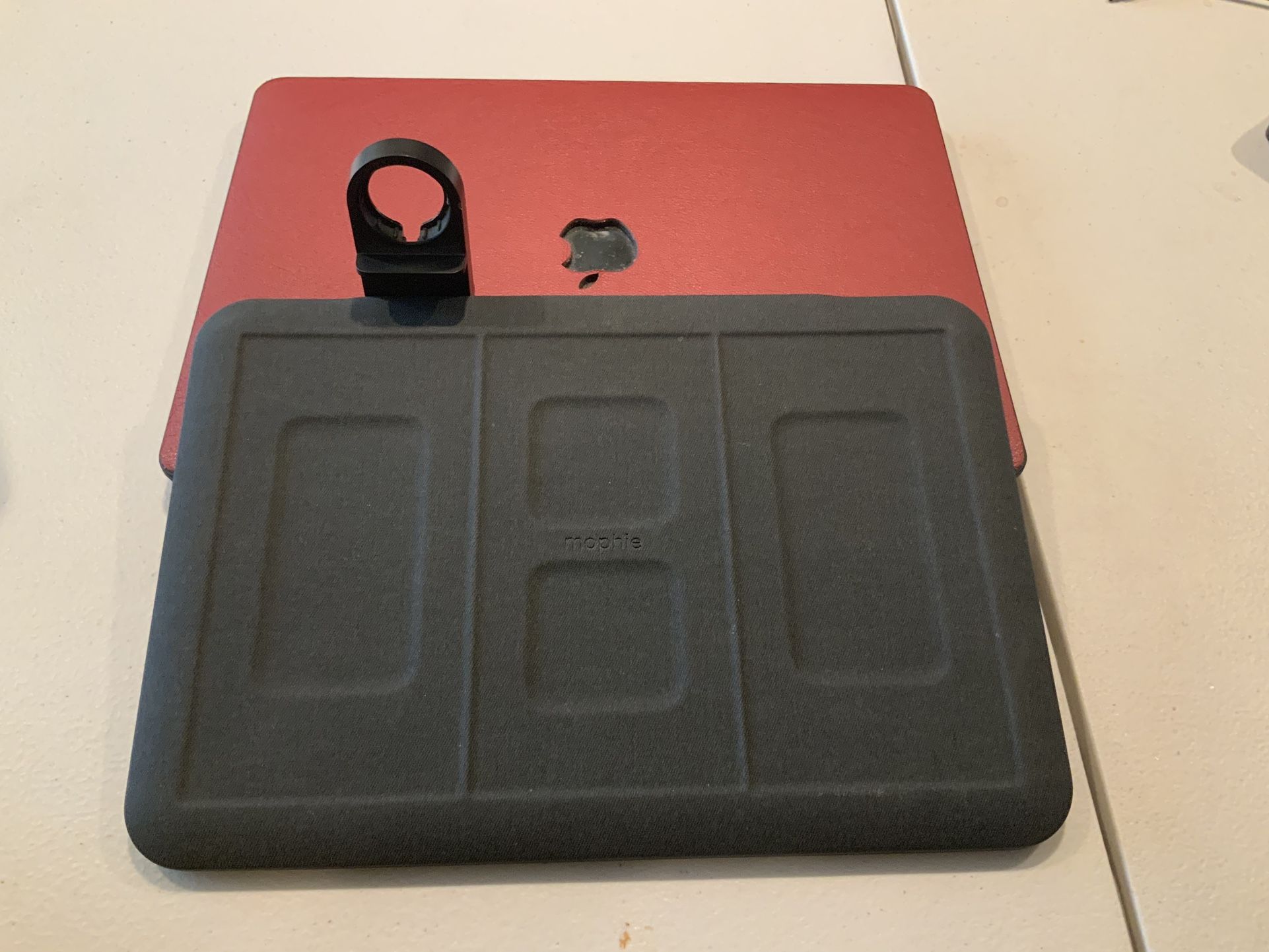 Mophie 4-in-1 Wireless Charging Mat For Cell Phones, EarPods, And Cell Watches.