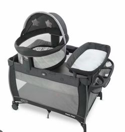 Play pen/ baby changer and bassinet
