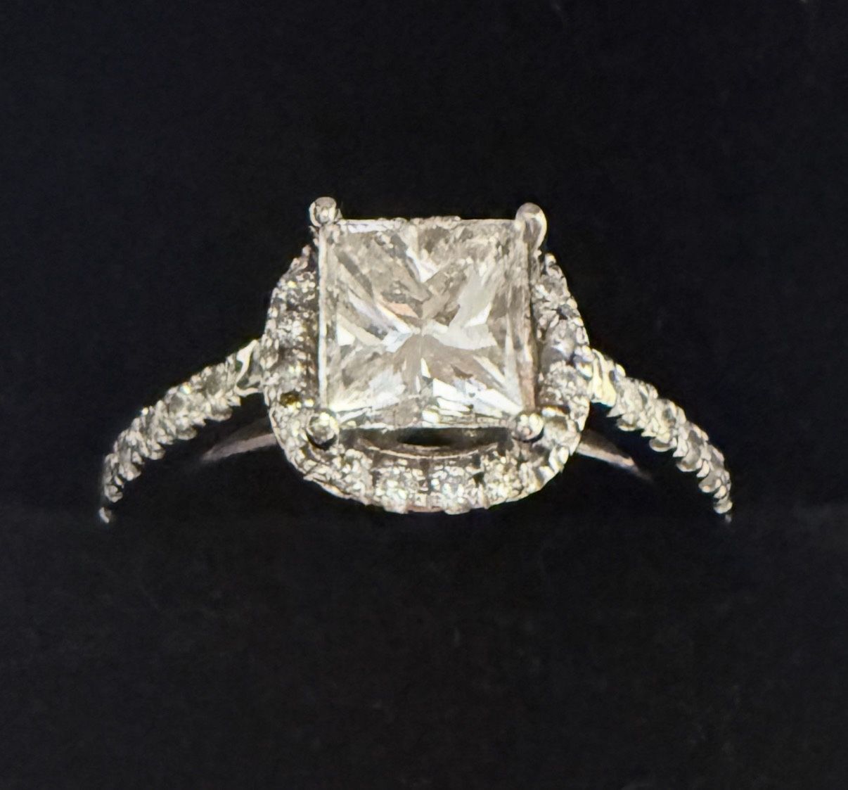 Diamond Ring, 1.01 Carat Princess Cut, Grade SI-1 (E) Color Natural Diamond. Asking $2,300.00.