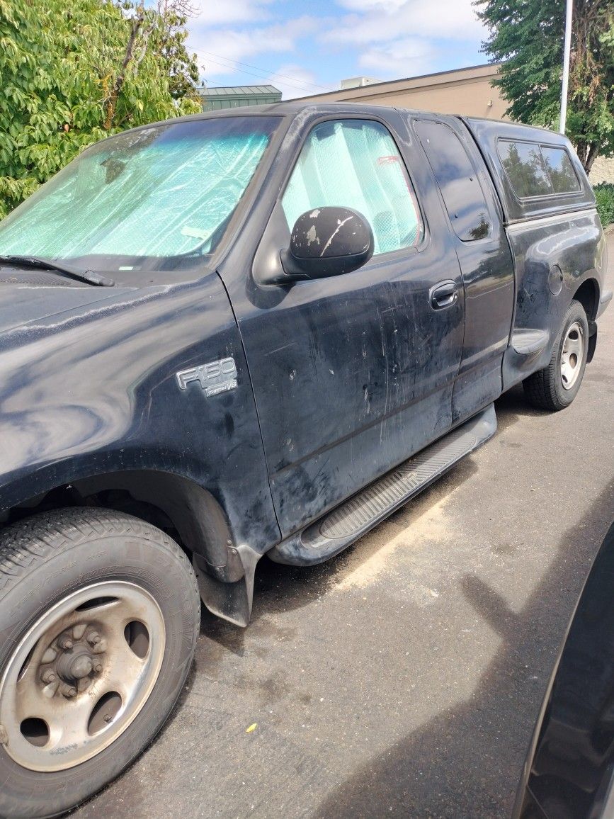 2001 F150 5.4 or Leer Camper Shell