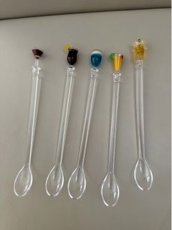 5 cocktail stirrers plastic.