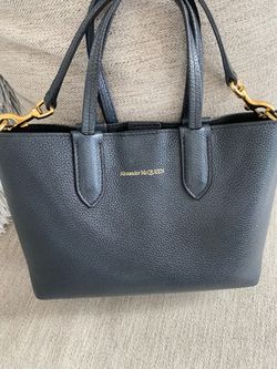 Alexandre McQueen small black leather handbag, crossbody and clutch