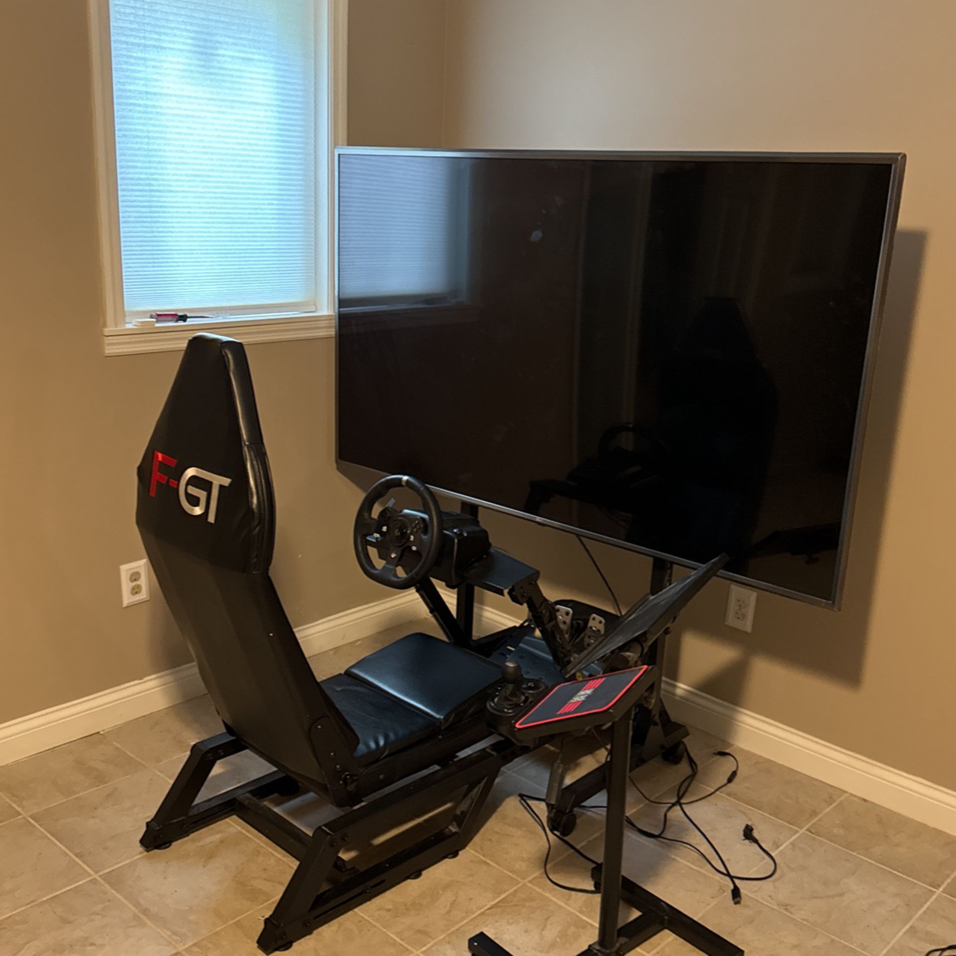 Racing Sim Hardware With 75in Tv