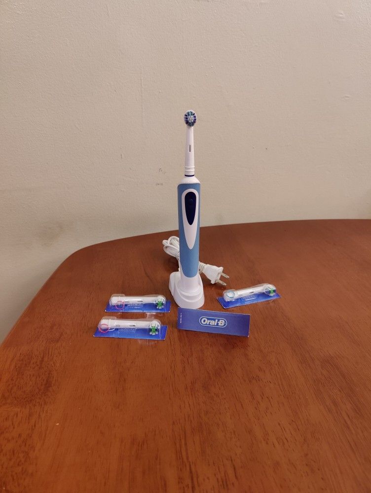 Ranir Rechargeable Electric Toothbrush like Oral-B + charging base + New 4 Oral-B Cross Action X Genuine Electric Toothbrush Replacement Brush Heads