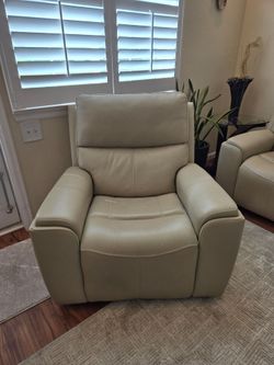 Comfortable beige leather recliner chair