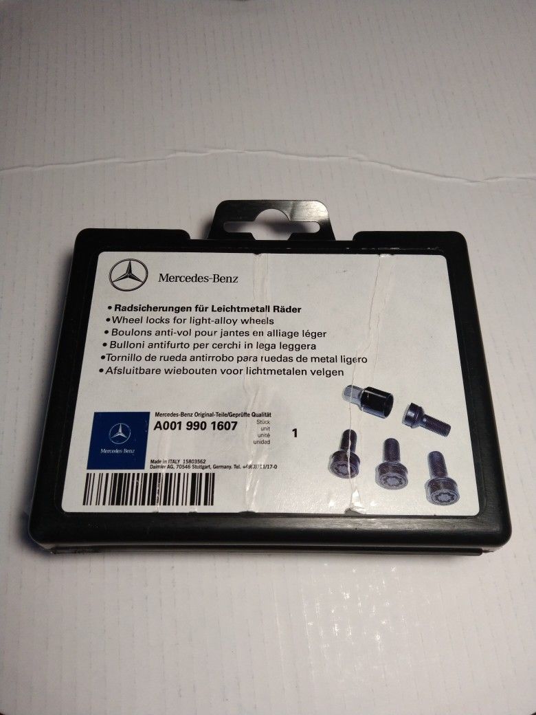 New Genuine Mercedes Benz Wheel Lock Nut Set Original Box A001(contact info removed)