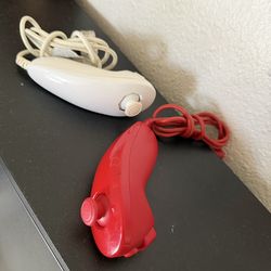 Nintendo Wii Nunchuk controllers - white and red $15 each