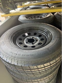 Brand new 205/75R15 Tire on 5-Lug Rim