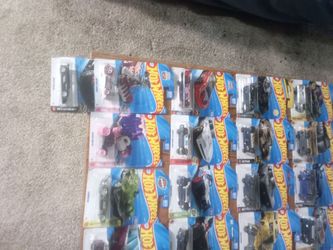 55 hot wheels and 2 hw Mario karts