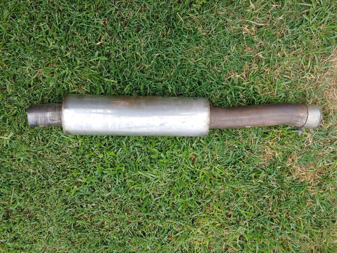 Nissan 350Z OEM muffler with chrome tips and a Borla resonator