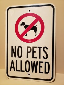 No pets allowed - vintage old aluminum sign