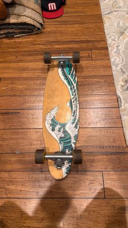 Longboard Skateboard with Wave Graphic