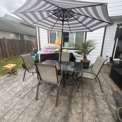 Free Table And (4) Chairs Umbrella Not included 