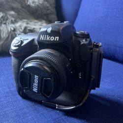 Nikon D2x (needs Internal Battery Repair) + 35mm/f1.8 Lens