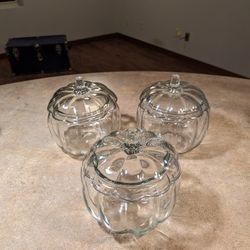 Three Vintage Anchor Hocking cooky jars heavy glass good condition. Measures 6.75" diameter x 7.75" H