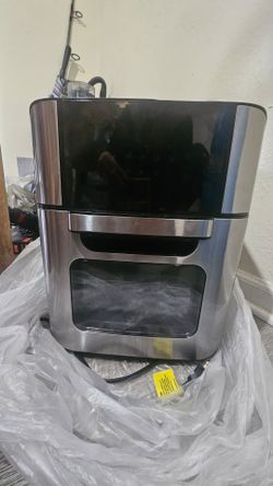 This is a stainless steel Emeril Lagasse PowerXL Air Fryer Oven.