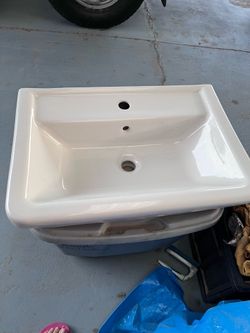White sink with hardware