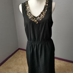 Gap black medium dress with sequin collar
With pockets 