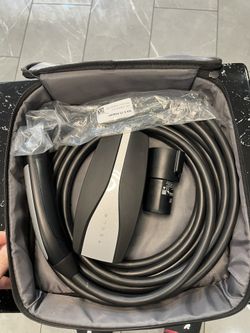 Tesla Mobile charger adapter included 