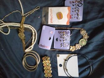$15 for all! Cool groovy bracelet, necklace,, over 15 pairs of earrings,rose bead belt