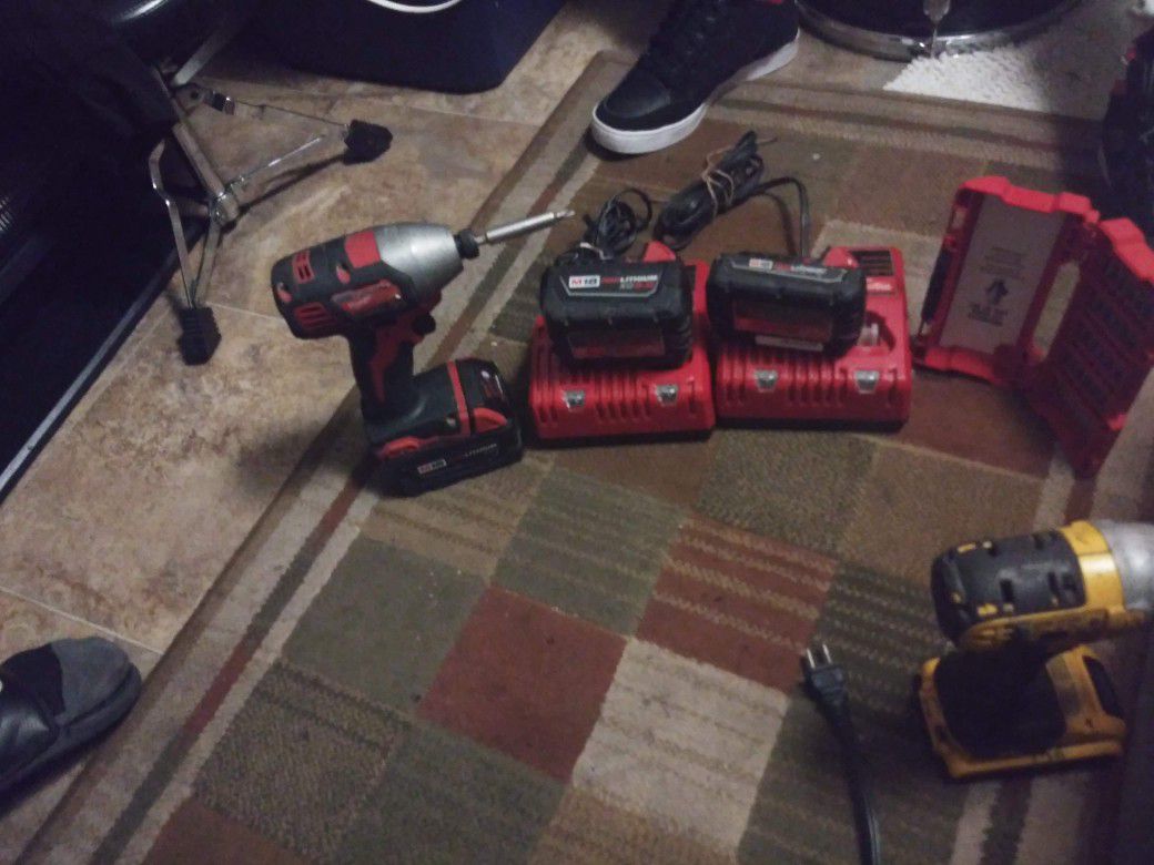 Milwaukee impact drill 2 chargers and 3 batteries + bit set