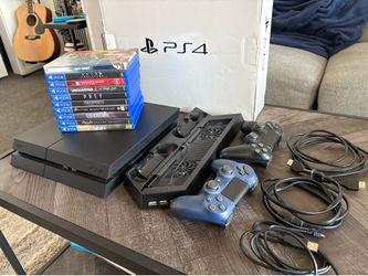 PS4 w/ Game Collection and Stand