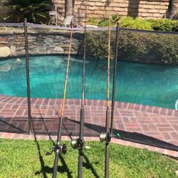  Three Saltwater Fishing Rods With Penn Reels.