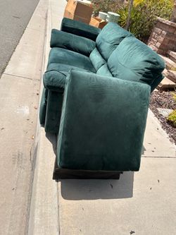 Free reclining couch and love seat