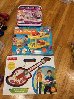 Disney Puzzles, Tea Time Trolley Fisher Price Guitar $20 Each