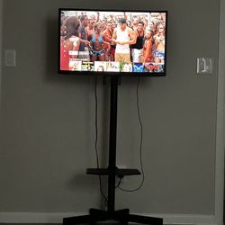 Tv With Rolling Cart 