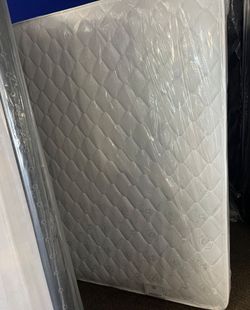 Queen Mattress Still in Plastic Wrap