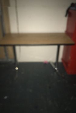 rectangular brown wooden table