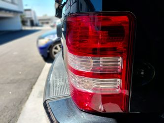 OEM Tail Light Assembly Red and Clear