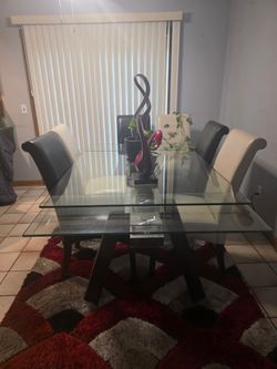 Glass table with chairs