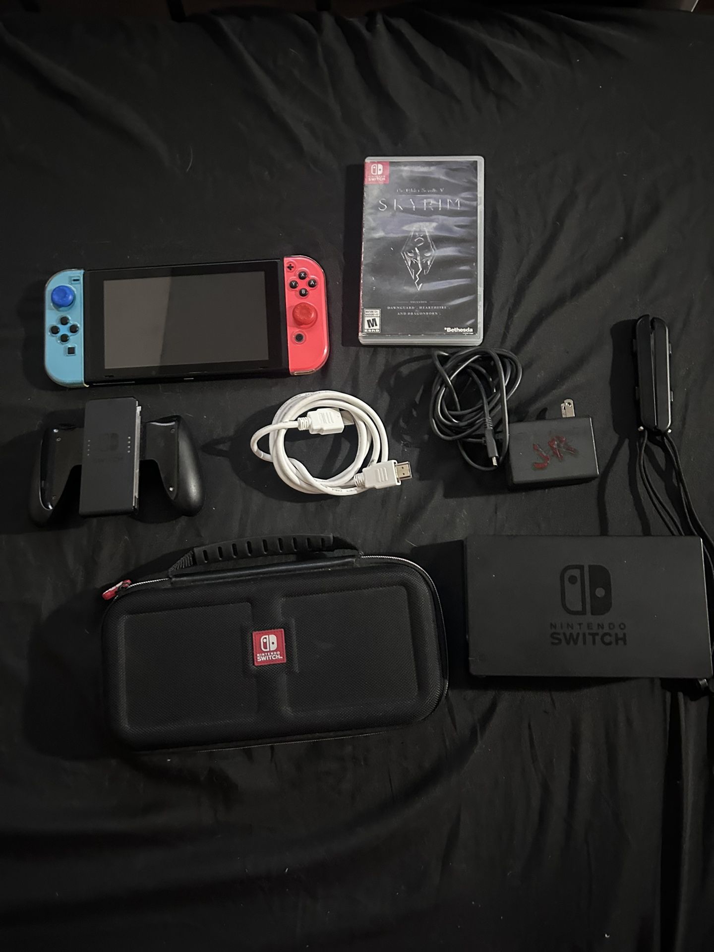 Nintendo Switch (Neon Red/Blue) – Like New + Skyrim + Accessories