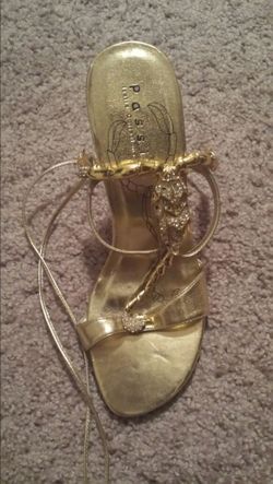 Brand new Gold Scorpion wrap around heel