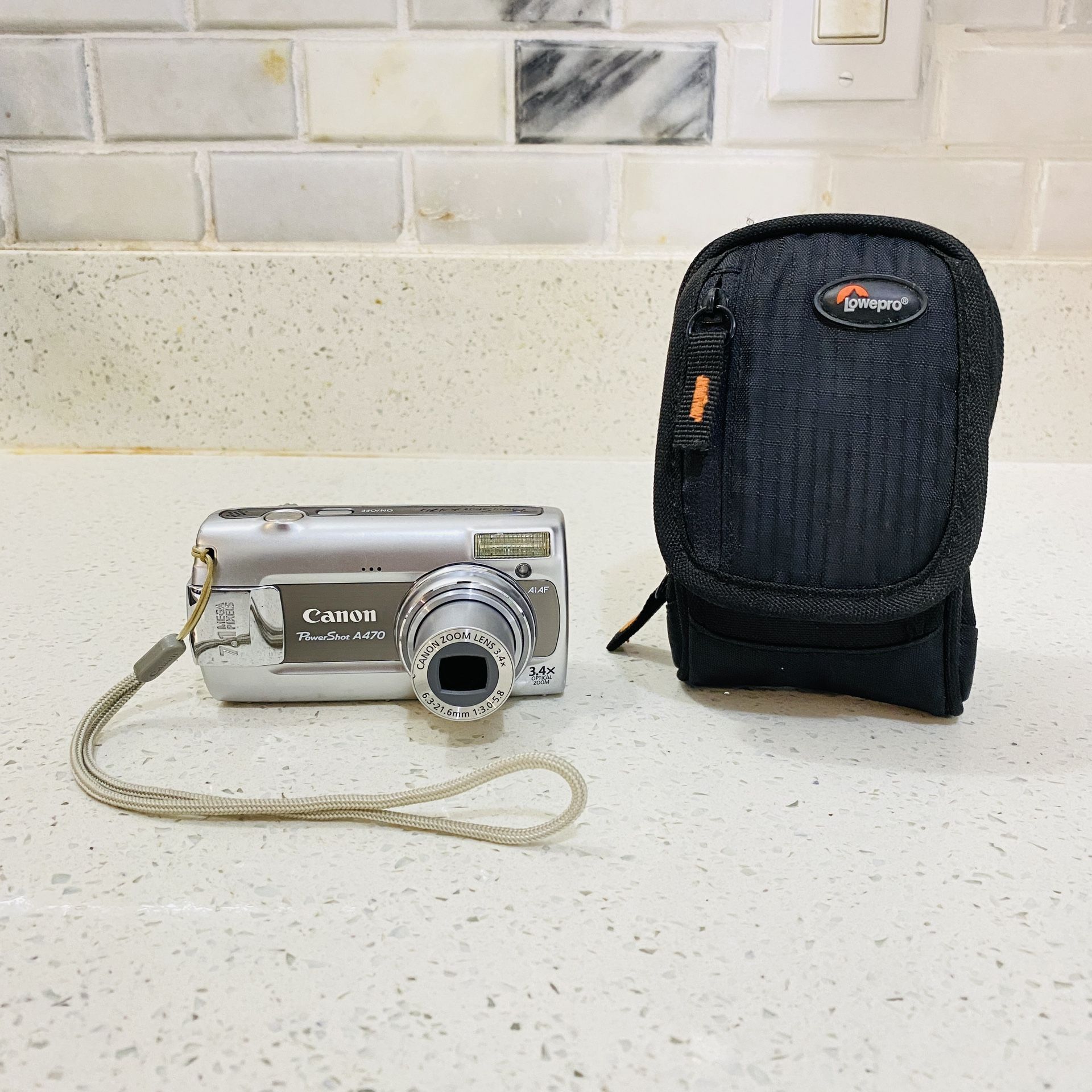 Canon PowerShot A470, 7.1MP Digital Camera, Blue, 3.4x Optical Zoom with pouch