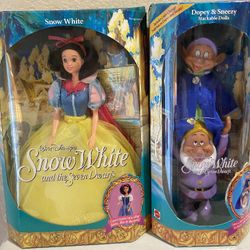Snow White Barbie And
Dopey and Sneezy
