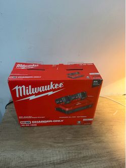 Milwaukee charger and battery 8.0 . EACH
