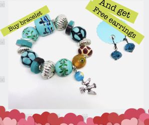 Ceramic beads slip on bracelet with angel charm - NEW