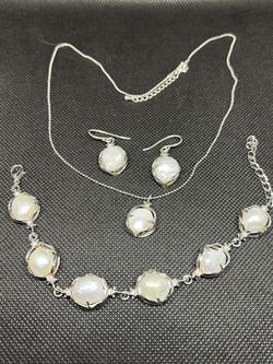 Jewelry Set: Earrings, Pendant, Bracelet
