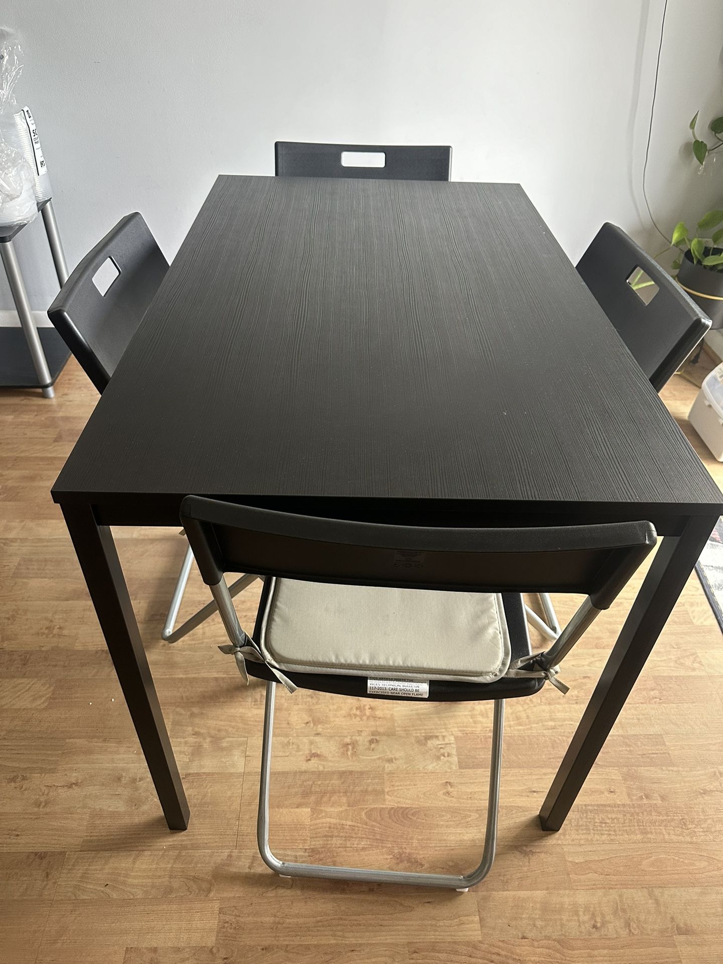 Dining Table And Four Chairs