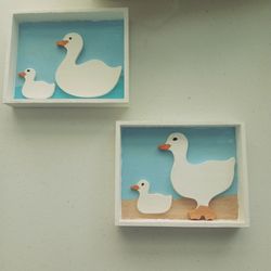 Ducks in water and sand decor